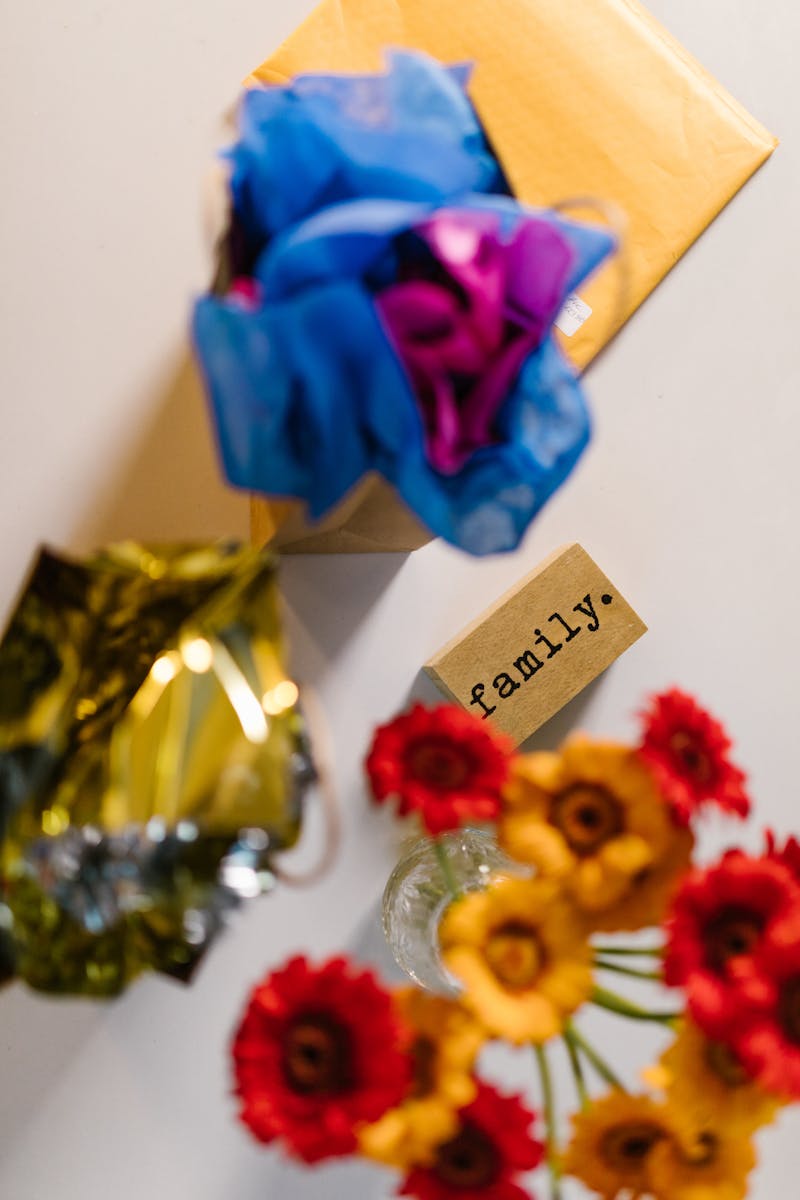 Bright floral arrangement with a 'family' note, perfect for celebrations.